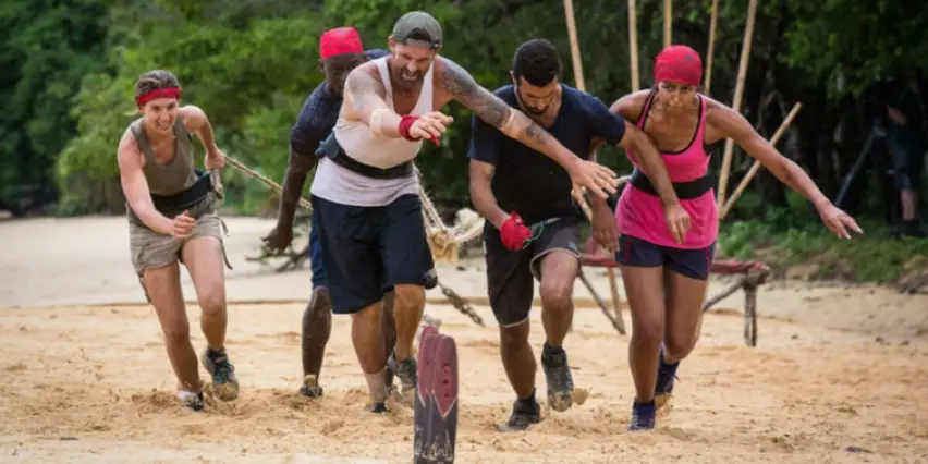 Quel est le nom de l'épreuve où les candidats doivent transporter des sacs de sable sur une longue distance ?